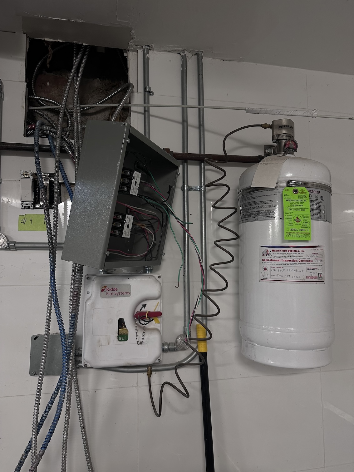 Master Fire Prevention Cost to Retrofit Restaurant Kitchen Fire Suppression System NYC 1